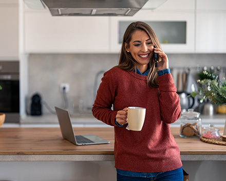 Woman Calling to Get a Cabinet Refacing Job Done