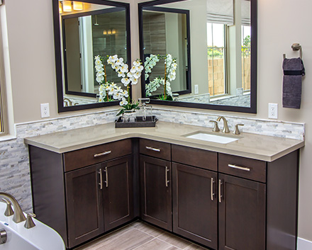 Recently Refaced Bathroom Cabinets With a Modern Wood Look After Our Bathroom Cabinet Refacing Services